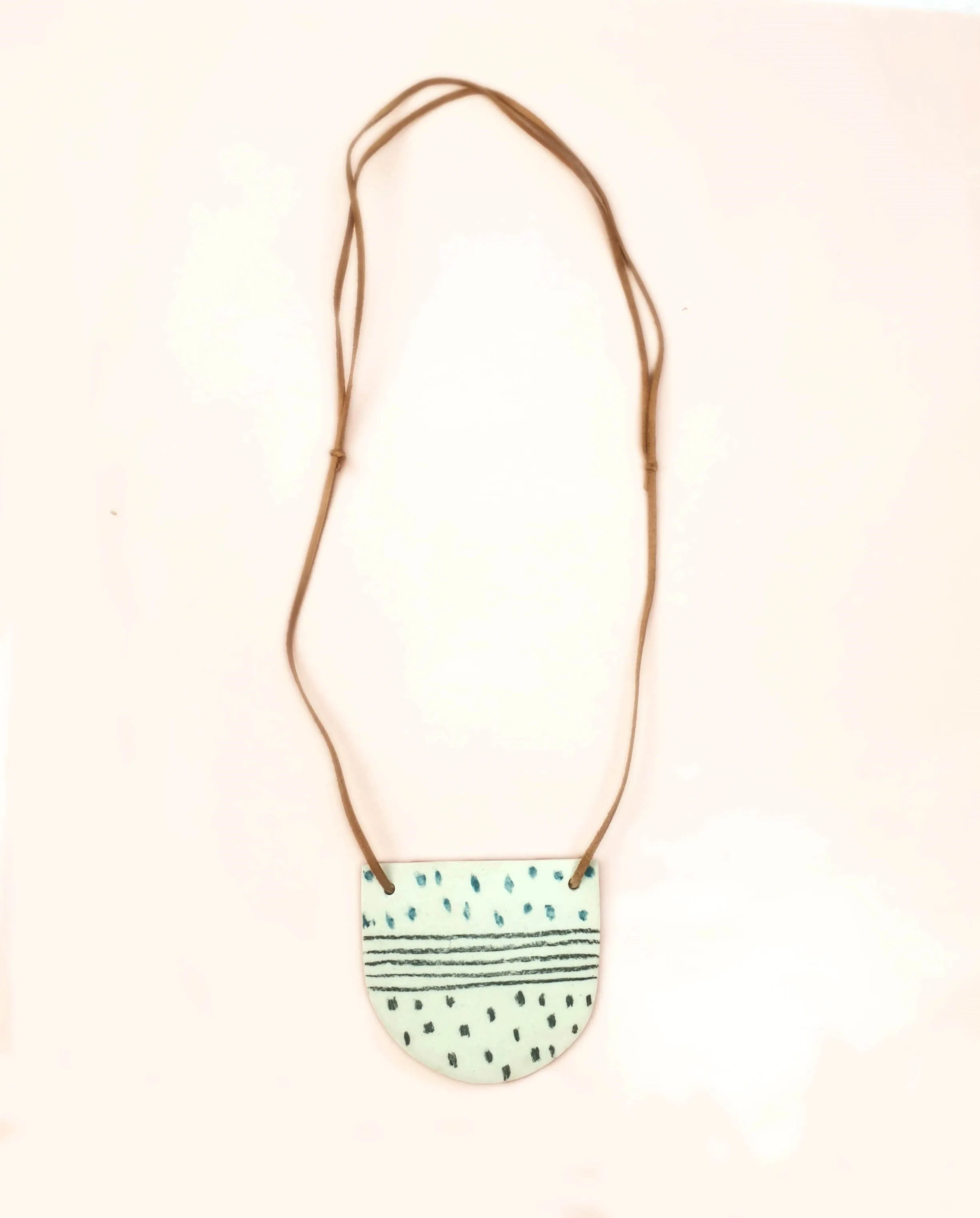 Handmade half-moon shaped necklace