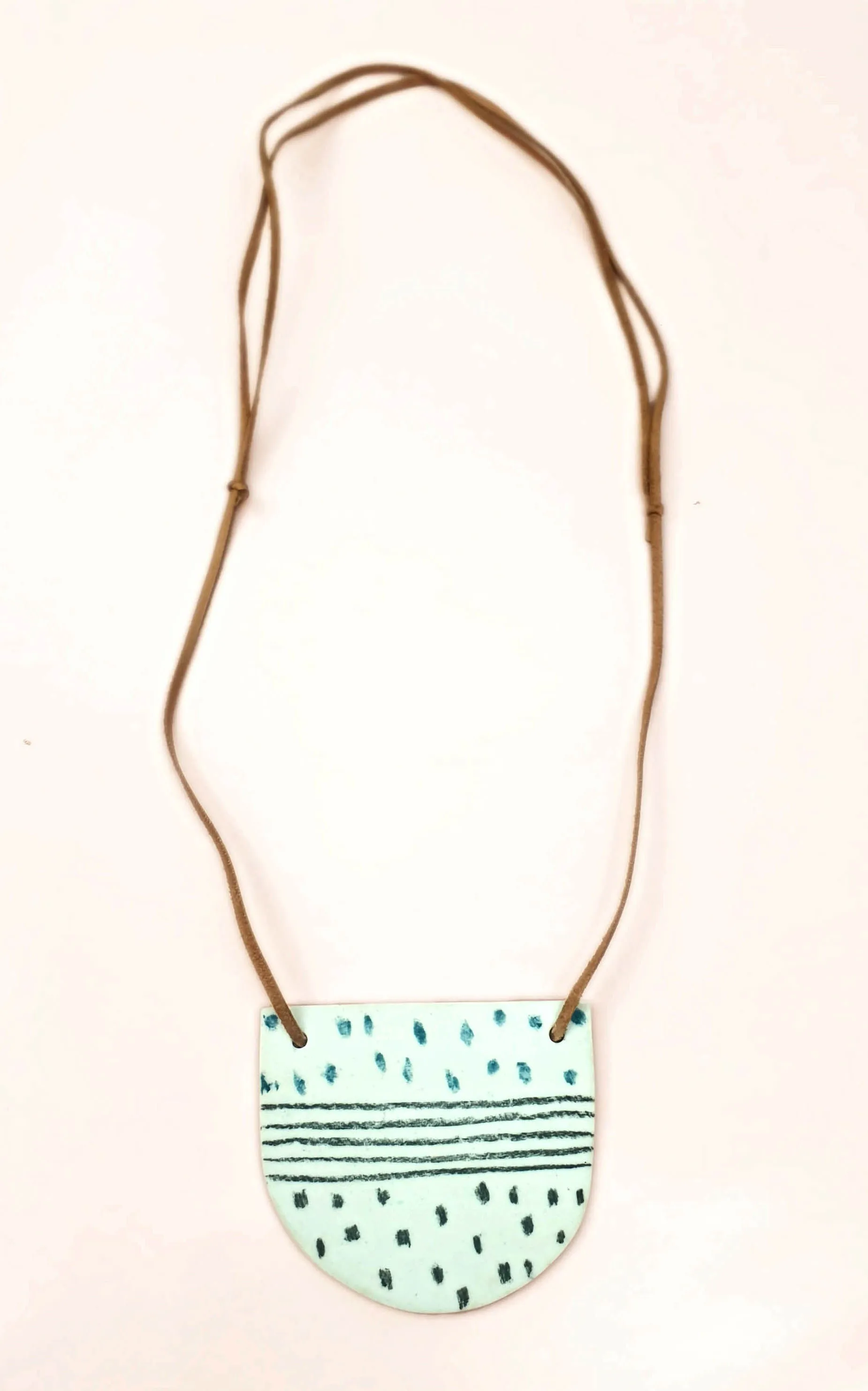 Handmade half-moon shaped necklace
