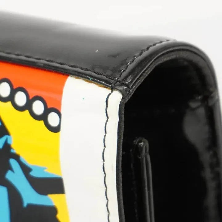Vintage CHANEL patent enamel clutch bag, wristlet in mademoiselle portrait, Just a drop of Number 5, in black, yellow, and red.  050907rk1